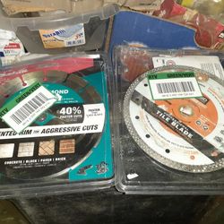2 Tile Saw Blades One Is A Makita And The Other One Is A Ridgid 7in