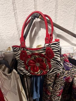 Red and zebra purse