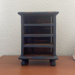 Tiny free standing shelf