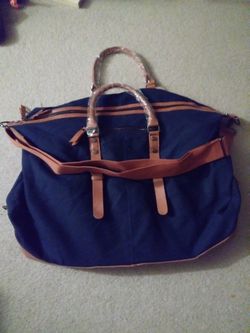 Huge travel bag with straps and handles