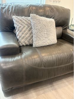 Leather recliner sofa and loveseat,