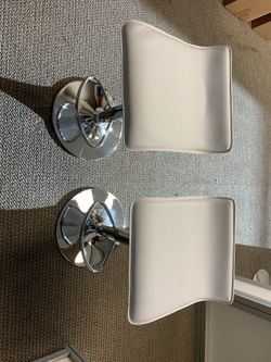 2 White Adjustable Barstools 