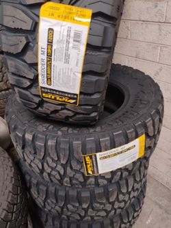 New set of tires aplus mud terrain 33 1250 17 lt