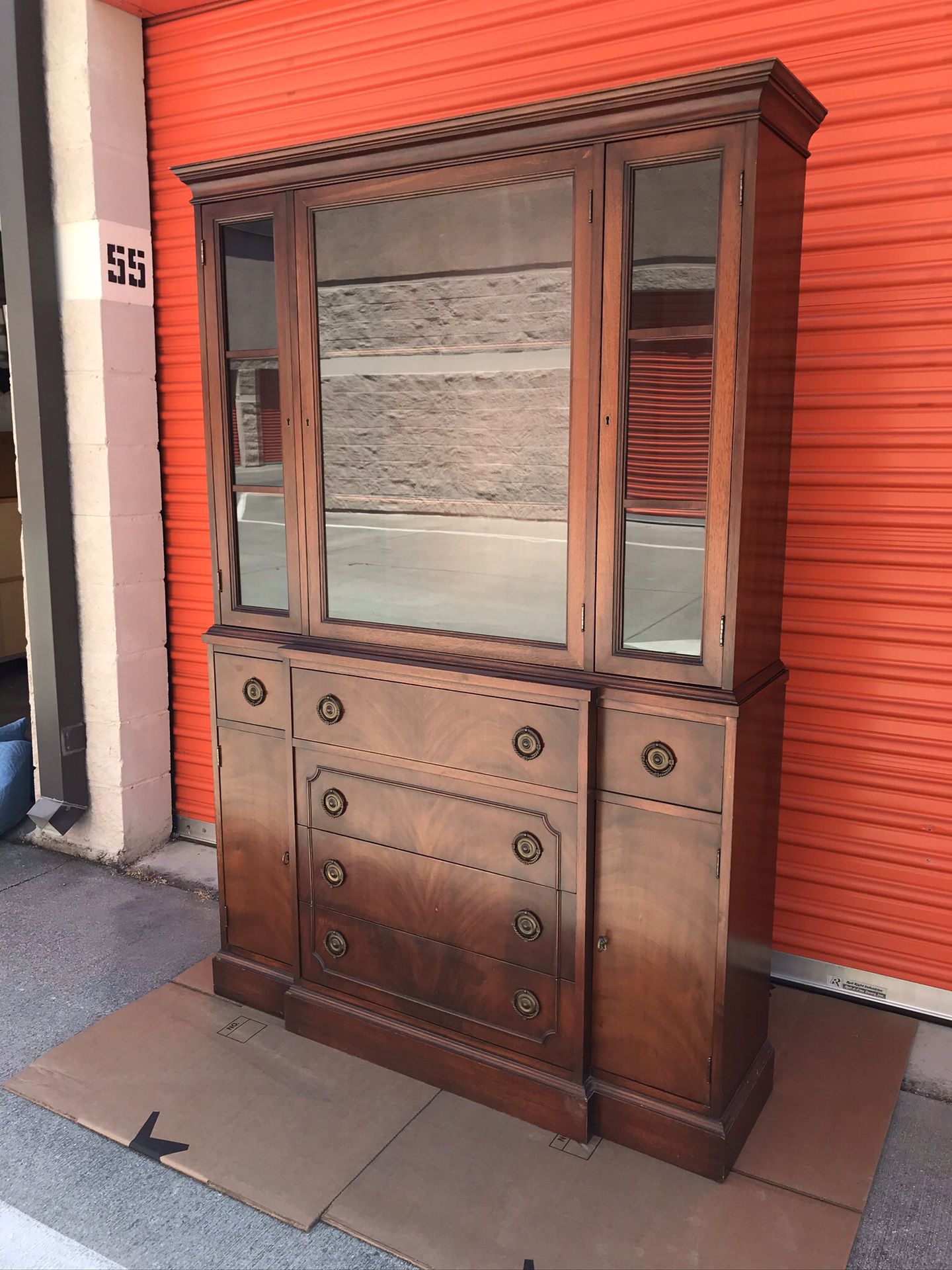 Antique... china cabinet with middle drawer that turns into a table