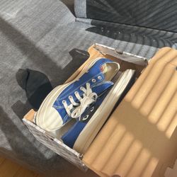 Blue CDG Converse