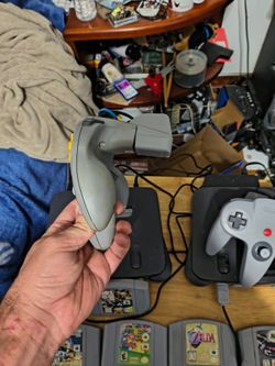 2 Nintendo 64 consoles with games