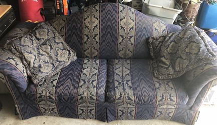 Blue couch with 2 matching throw pillows!