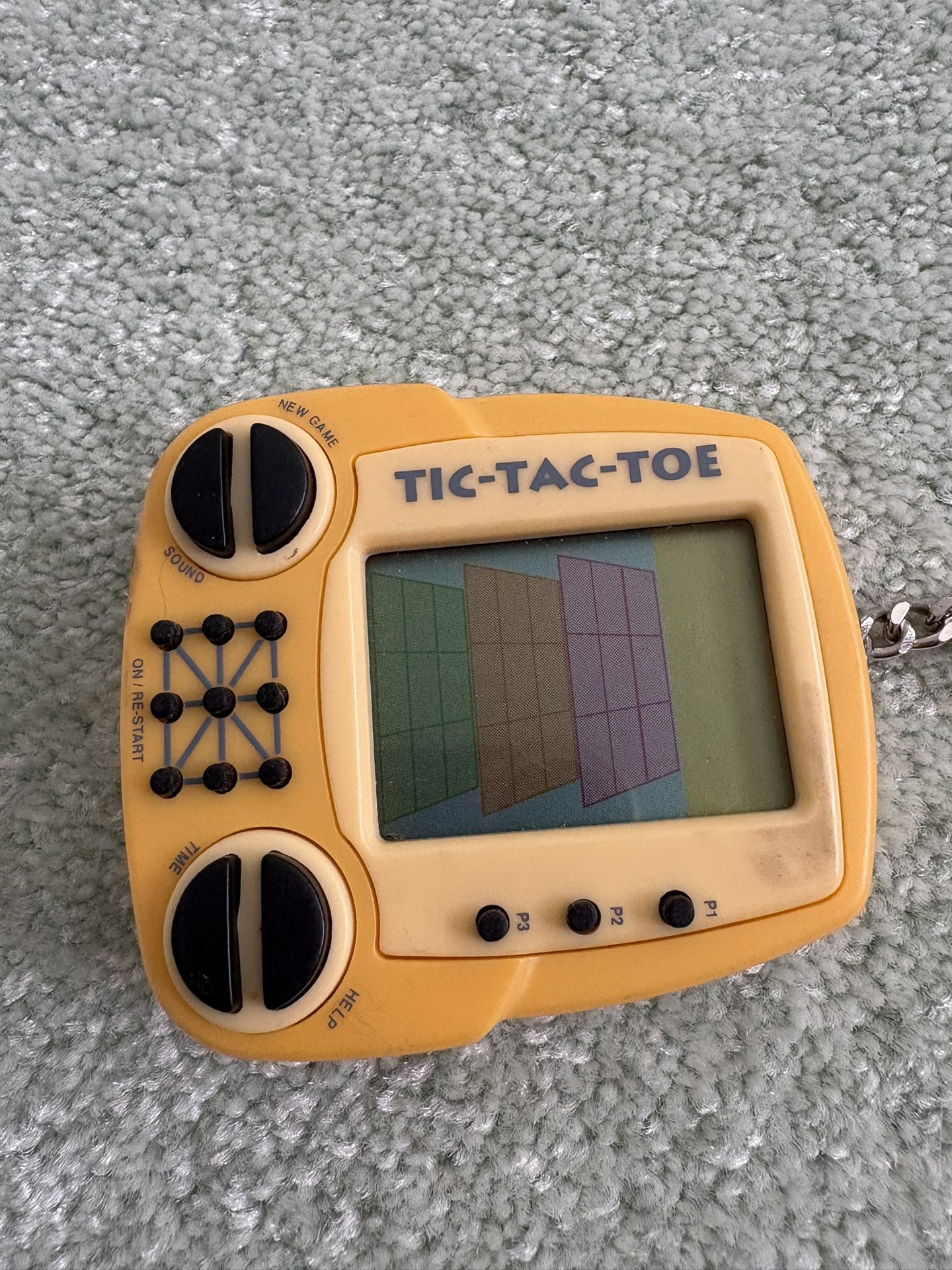 1999 Handheld Portable Electronic Tic-Tac-Toe Game Keychain By MGA