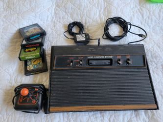 Atari 2600 w/controllers and 4 games