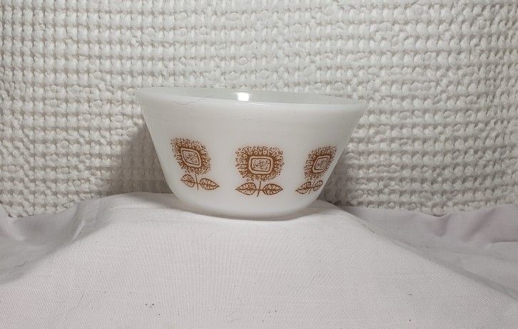 Vintage Federal milk glass bowl with tan flowers on the sides . 