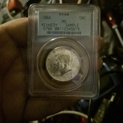 PCGS Mint uncirculated Rated 1964 90% silver  Kennedy half dollar 