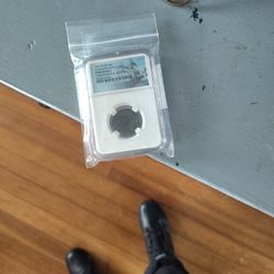 pirate Coin 1655 graded like new sealed