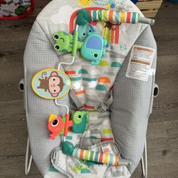 Bright Starts Playful Paradise Vibrating Baby Bouncer with Toys