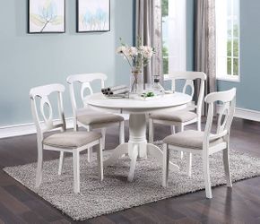 Round dining table with 4 chairs