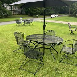 Patio set with 4 rocking chairs include umbrella