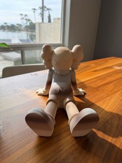 XL 3D printed KAWS MacBook holder figurine