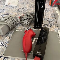 2 nintendo wii consoles  with two remotes And All Cords