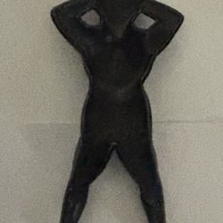 Antique Cast Iron Figurine of Naughty Nellie.