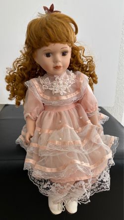 Porcelain Doll 16” (sitting)