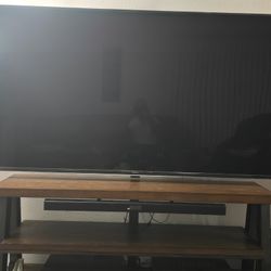 Samsung 75 Inch TV with sound bar, subwoofer and a heavy duty Stand 