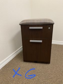Filling Cabinet With Cushioned Seat On Rollers