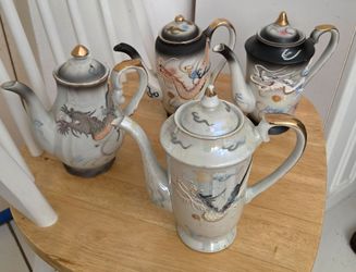 4 Vintage Japanese Dragonware coffee pots, 7‑8 inches tall. All lids included, excellent condition no chips/cracks. Moriage raised dragon detail. Whol