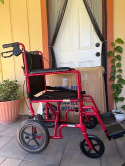 Red Transport Wheelchair with Footrests