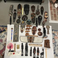 Collection Of Antique African Masks And Statues