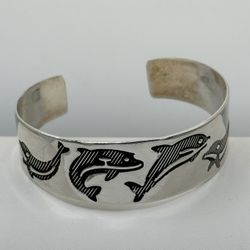 Vintage Sterling Silver Cuff Bracelet Etched Dolphins  71/2” Long 1 1/2” Opening  26.72 Grams Very Rare Good Condition 