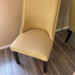 Beautiful Light Yellow Fabric Chair With Nail Head Accents