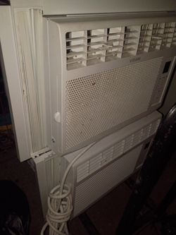 Two widow air conditioners with one remote