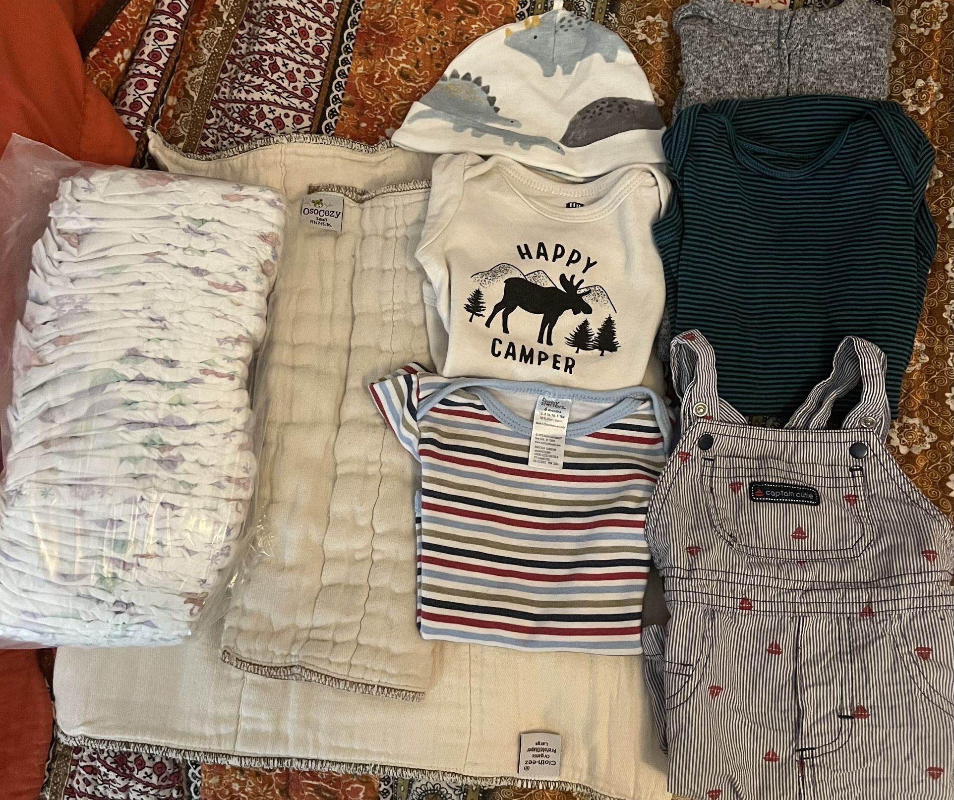 Baby Diapers And Clothing Bundle