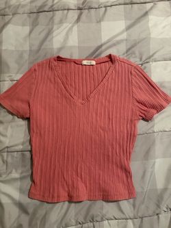 Pink ribbed short-sleeve crop top with a v-neck
