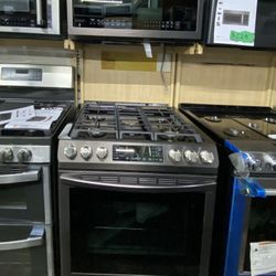 Samsung Gas Range + Over the Range Microwave in Tuscan Steel