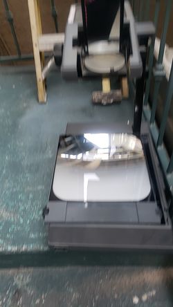 Over head projector and transparent paper included