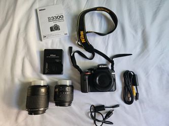 Nikon 3300 DSLR camera with 18-55mm and 55-200mm lens.