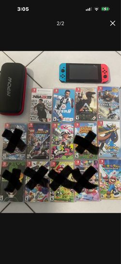 Like New Nintendo Switch With Box And 8 Games And Carrying Case