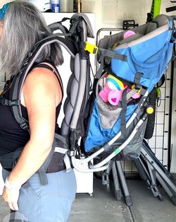 Kid carrying hiking backpack- deuter kid comfort II