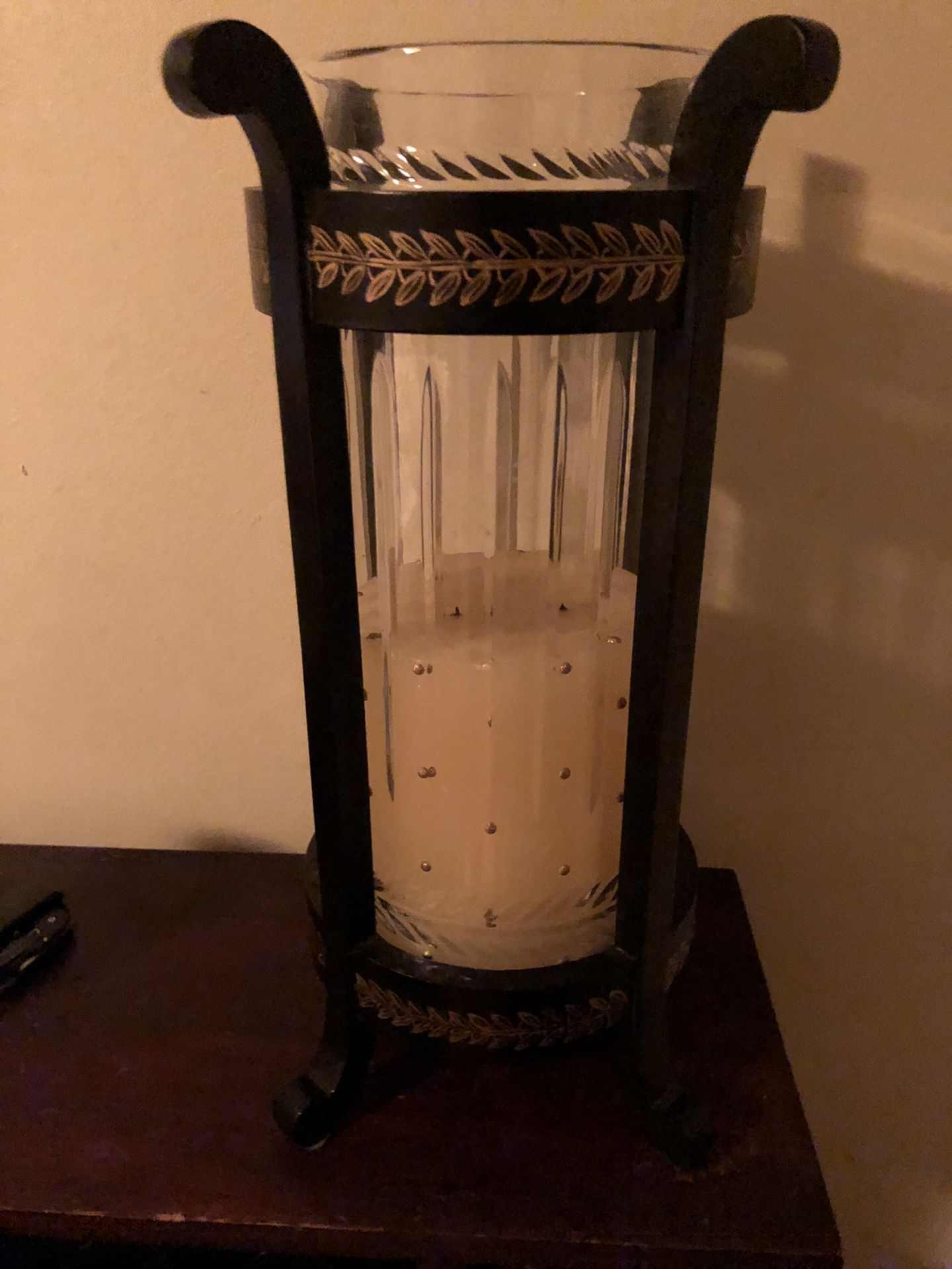 Candle holder with decorative candle