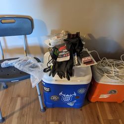 2 Coolers.  1 Pressure Washer Handle  New , Shower Stool. Assortment Of New Gloves. Tape.Sander Block,Other Items