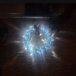 50 inch artificial LED light up wreath. I will also throw in a 24 inch artificial wreath for free.