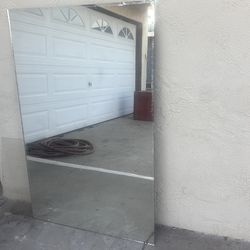 Mirror 32 wide bye 4 Ty 2 inches tall