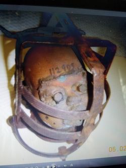 Vintage Industrial brass doll head mold in cage Macabre antique creepy arts/crafts