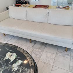 Gray leather couch and chair