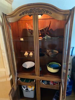 Wooden China cabinet with glass doors