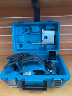 Makita KP0800K 3-1/4" corded planer in blue.