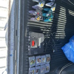 Nintendo 64 With Four Controllers And 8 Games