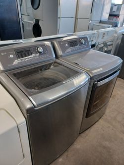 LG GRAY HE TOP LOAD WASHER AND ELECTRIC DRYER SET