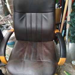 Desk chair brown leather in good condition.