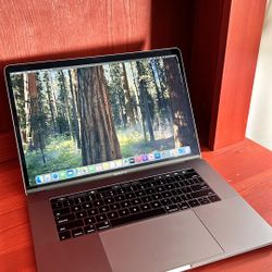 Apple MacBook Pro 15” Retina Touch Bar , I7, 16GB RAM 256GB SSD macOS 15.1 Sequoia $500